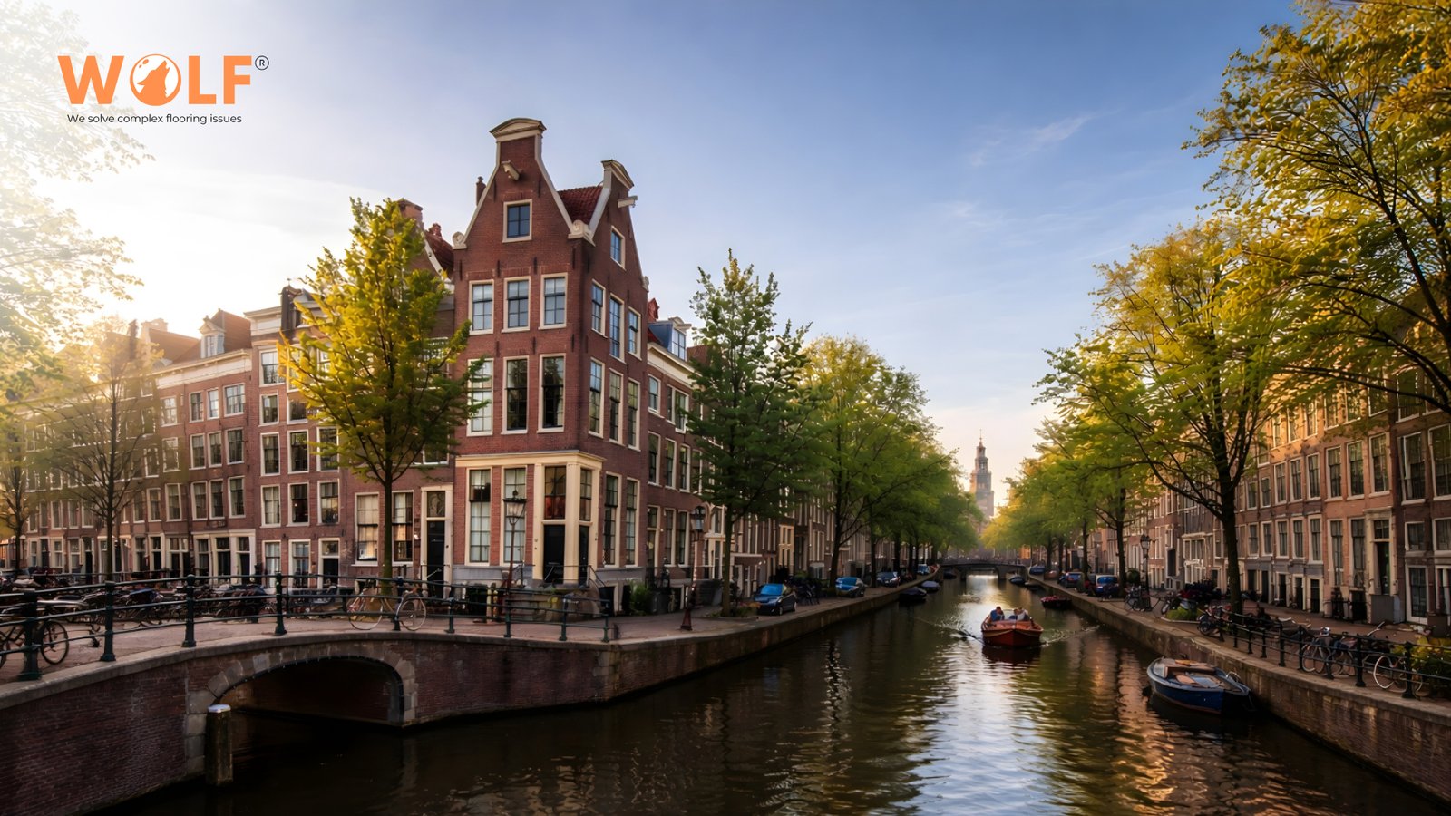 Traditional Amsterdam canal house grachtenpand architecture showing narrow Dutch building typical of compact urban homes