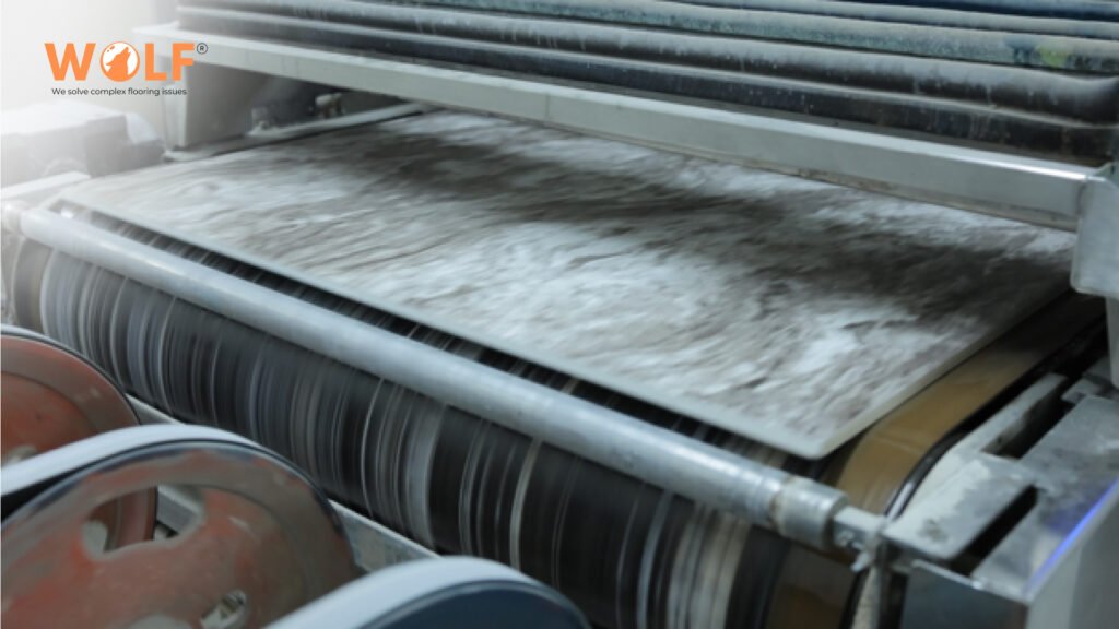 Porcelain tiles moving through an automated manufacturing line in India.