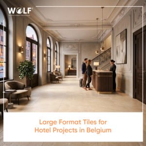Hotel lobby with large format porcelain tiles and guests at reception desk in Belgium