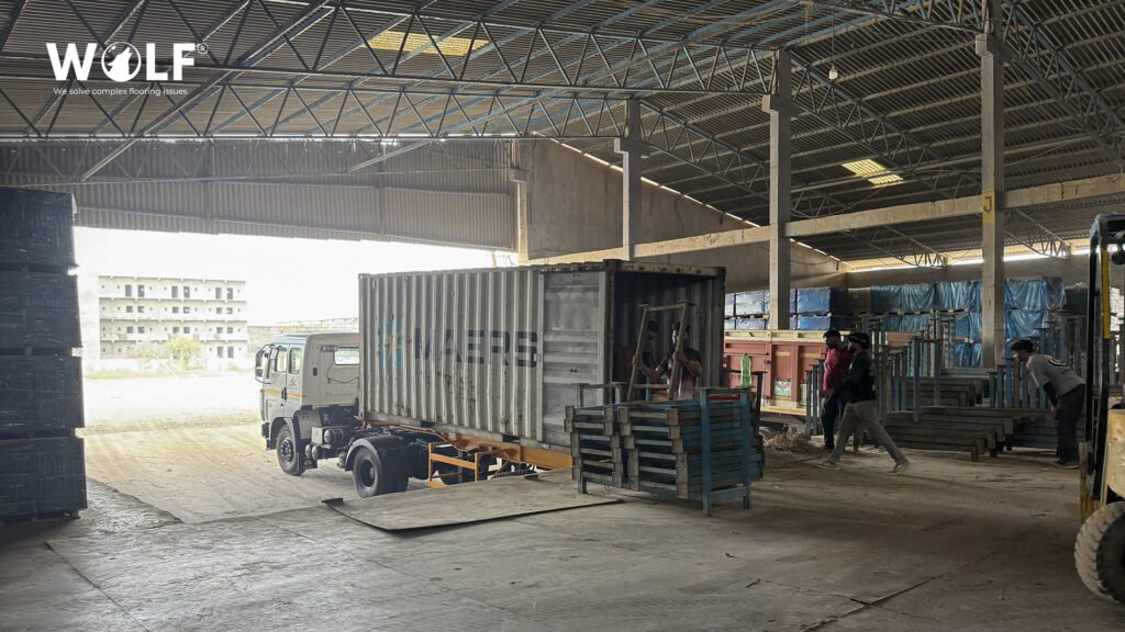 "Container being loaded with porcelain tiles for direct export from India to the Netherlands"