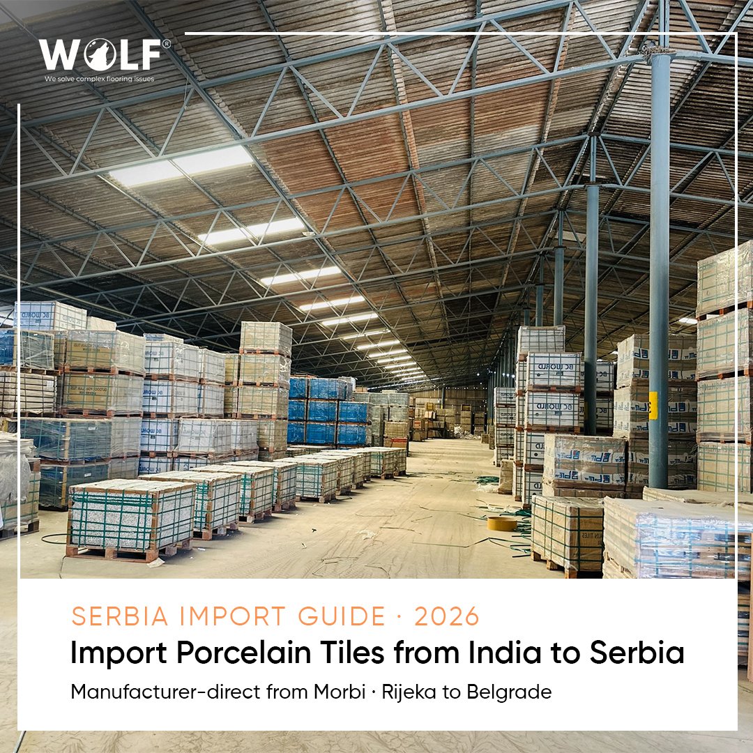 Warehouse stacked with packaged porcelain tile pallets ready for export from India to Serbia