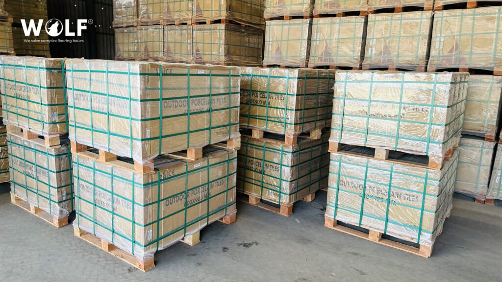 Porcelain tiles in strapped wooden export crates at Wolf's warehouse, ready for container loading