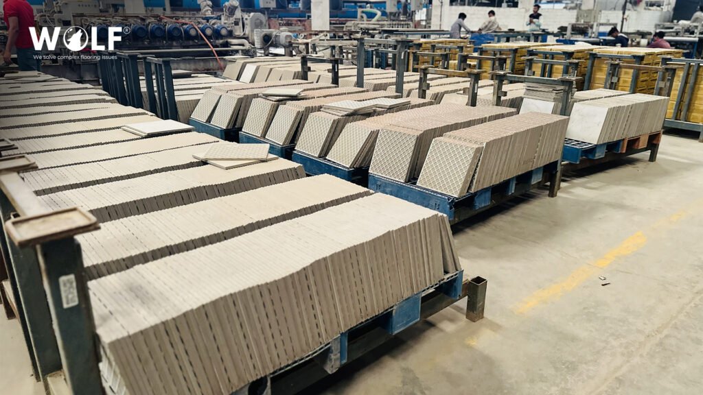 Finished porcelain tiles on racks at Wolf's factory in Morbi, India, before export packing